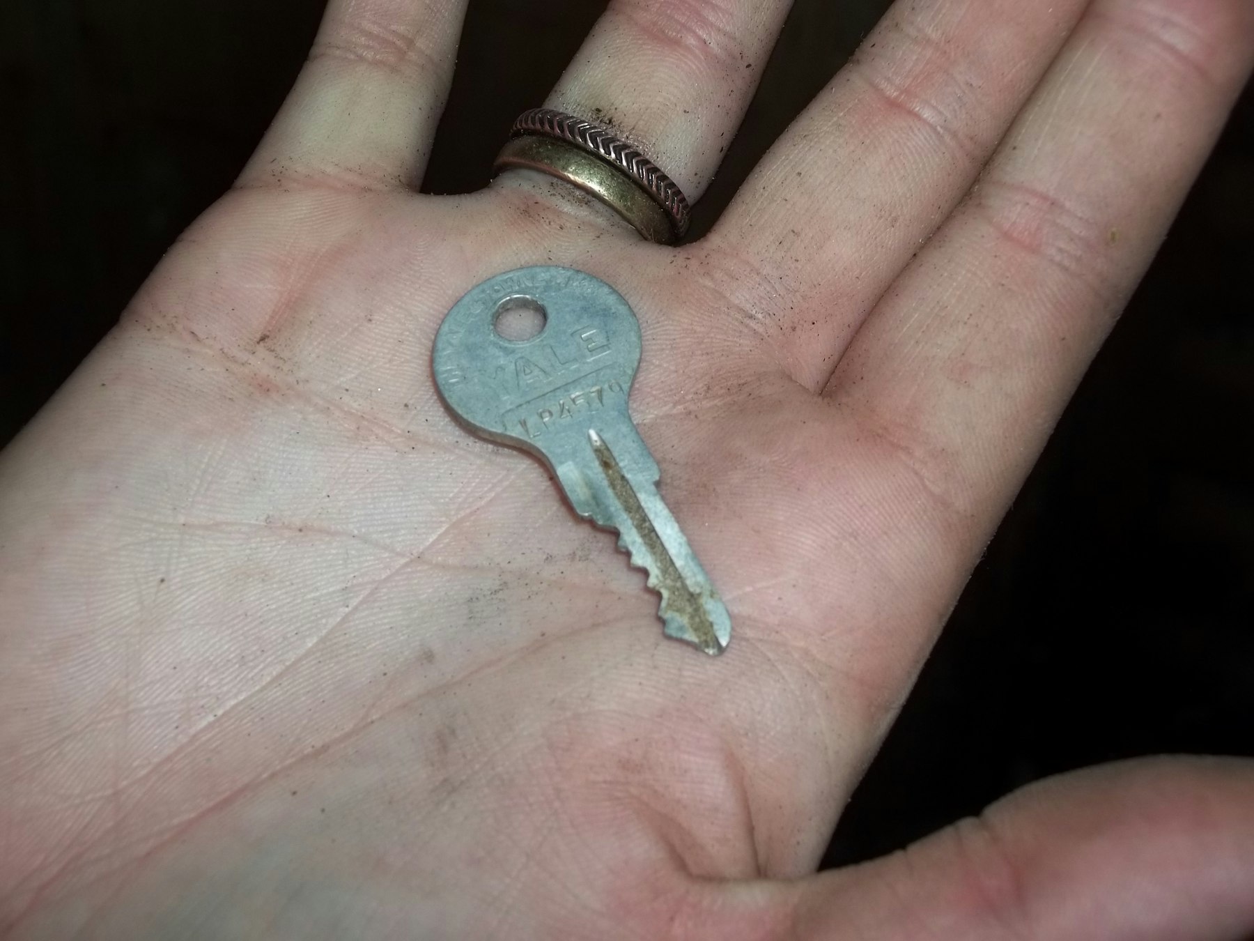 A single key resting in an open hand — the quiet moment when a homeowner decides it is time to hand the property back.
